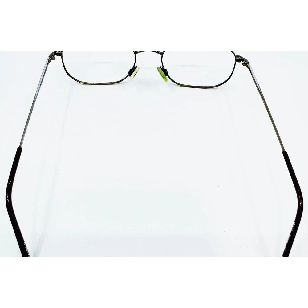 Flexon 600 Eyeglasses Unisex Brown Shiny Metal Oval Frame 52-18-140